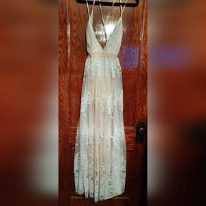 Cream color dress with Nude slip underneath. Sixe Medium